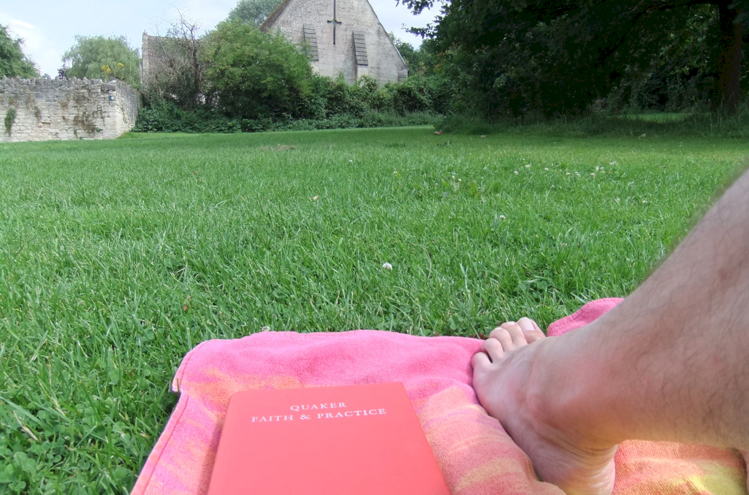 Quaker in the park with Tithe Barn in background