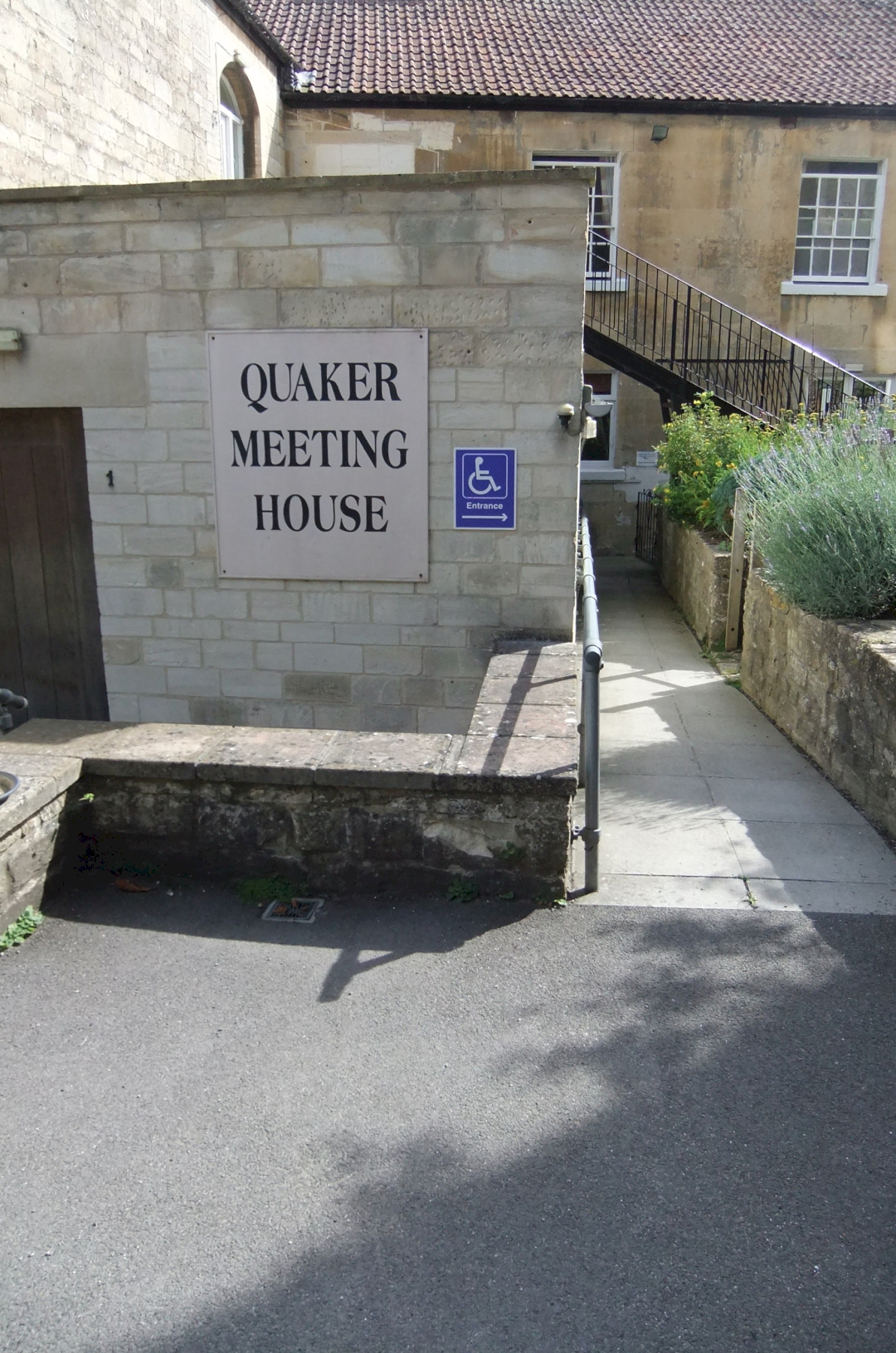 Level access to the right of the building